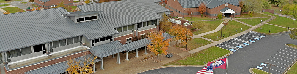 Aerial photo of the campus with the University Center in the foreground.